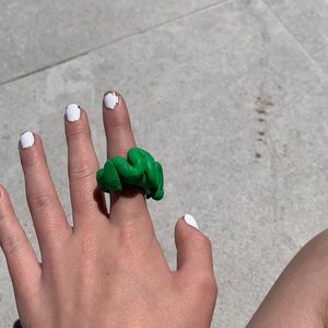 Light green swirly ring